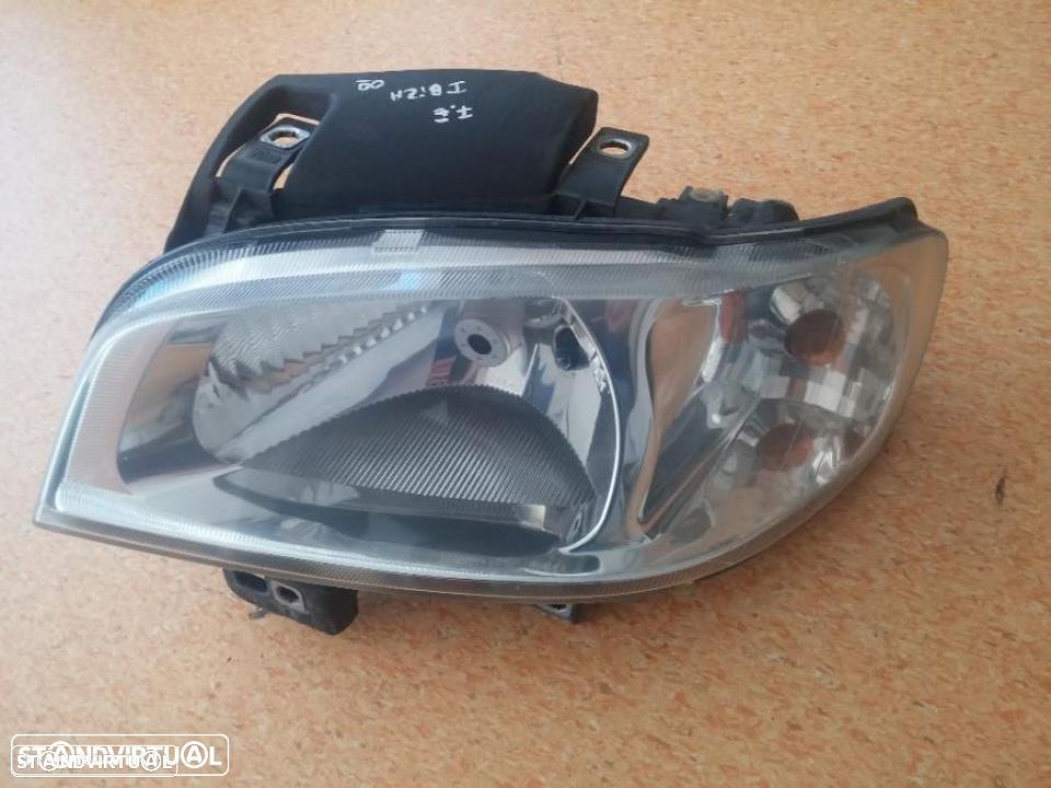 Farol optica esquerda seat ibiza 6k2 1999 a 2002 - 2