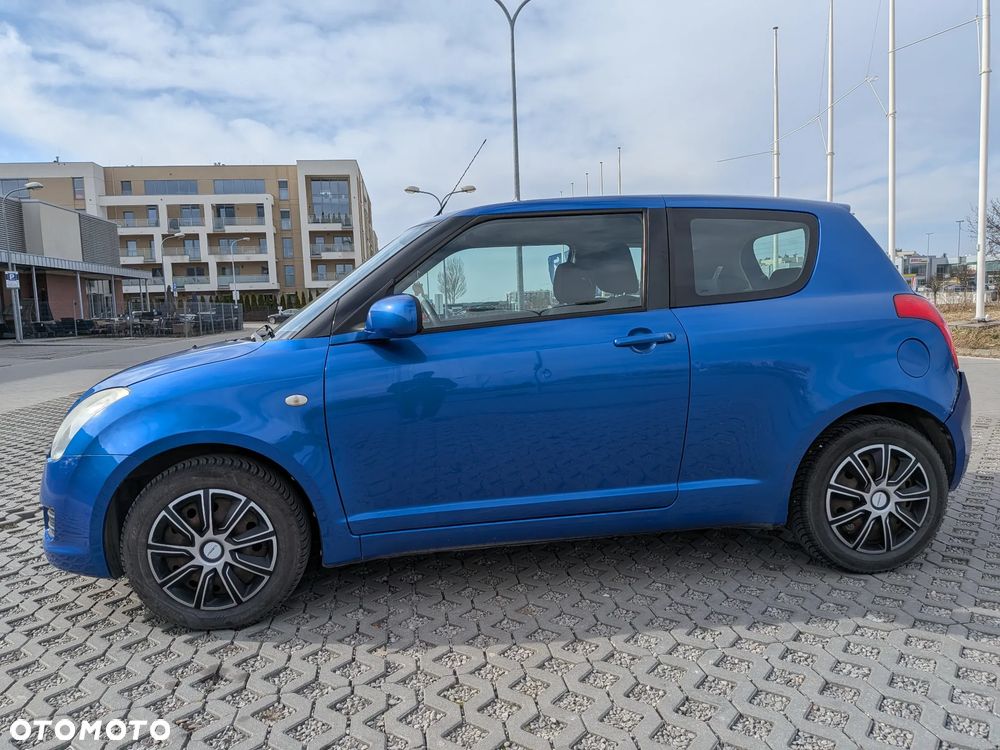 Suzuki Swift 1.3 Sakura - 4