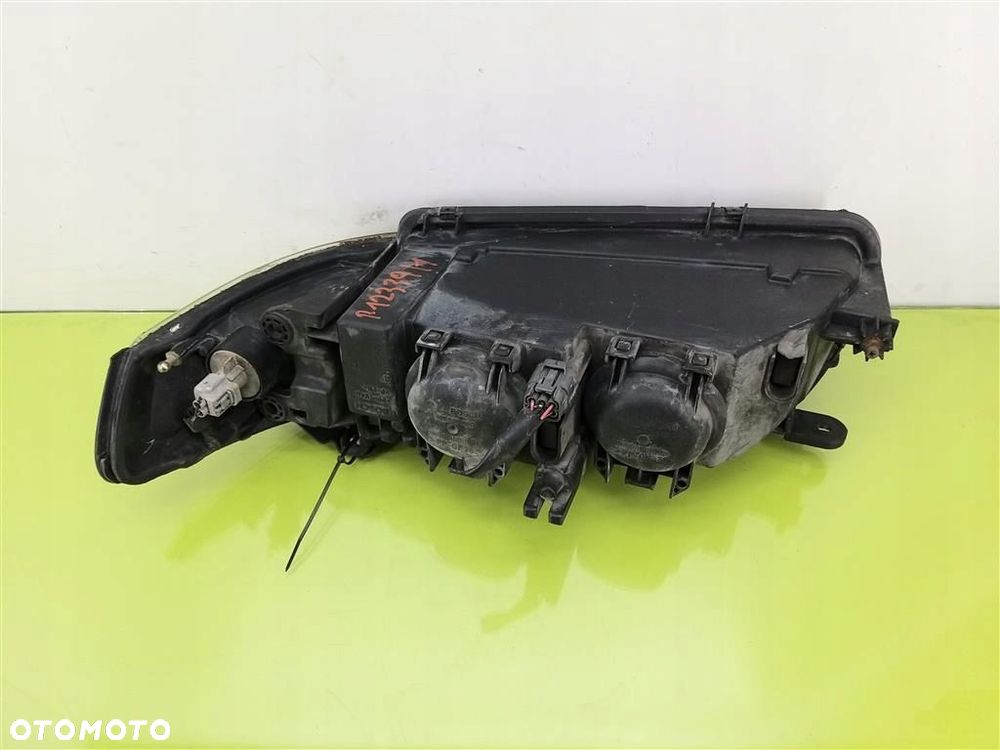 Reflektor lampa przód prawa Mazda 626 V 1997-2000 PRZED LIFT 1305623044 - 2