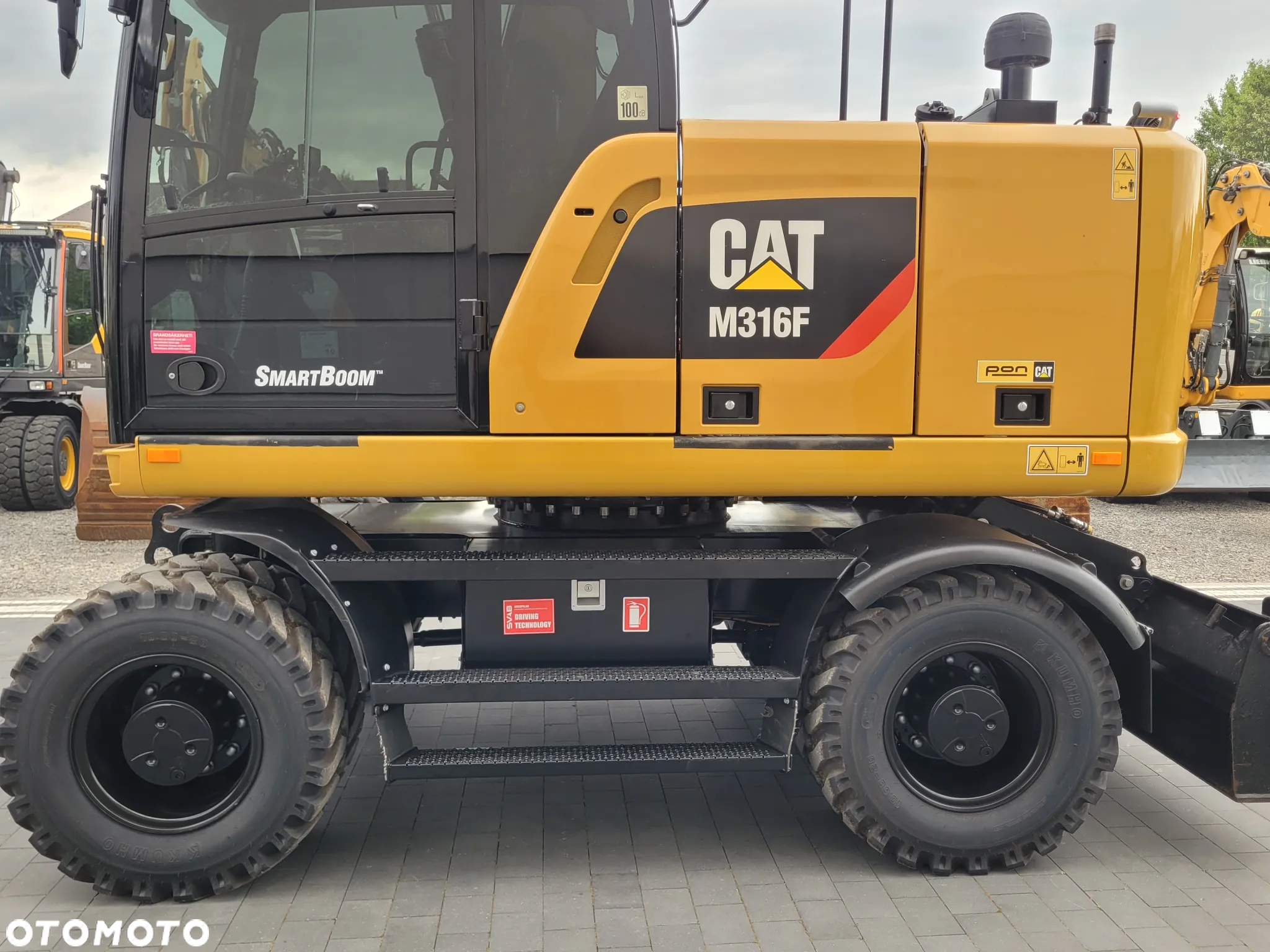 Caterpillar M316F / ROTOTILT ze szczypcami / sprowadzona / - 9