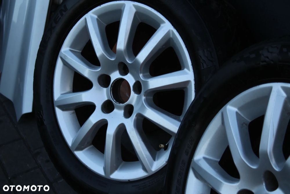 KOŁA FELGI ALUMINIOWE OPONY WIELOSEZONOWE OPEL VECTRA ASTRA ZAFIRA 16" 5x110 ET37 205/55/16 - 11