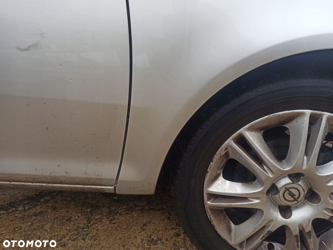 Błotnik prawy przód OPEL CORSA D Z157 06-11 - 7