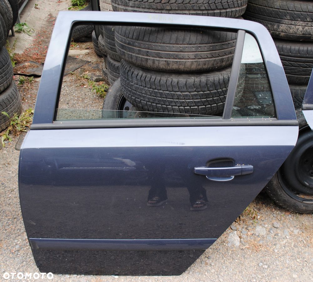 Drzwi lewy tył Astra III H kombi