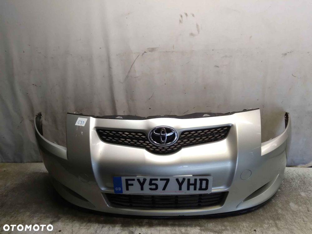 ^ ZDERZAK PRZÓD PRZEDNI DO TOYOTA AURIS I 1C0 SREBRNY HALOGENY - 1