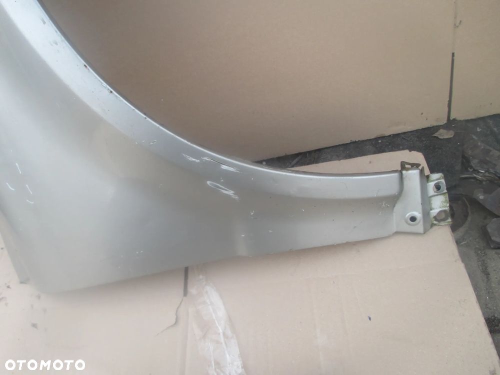 błotnik prawy VW Passat B5 FL Orginał bez rdzy - 7