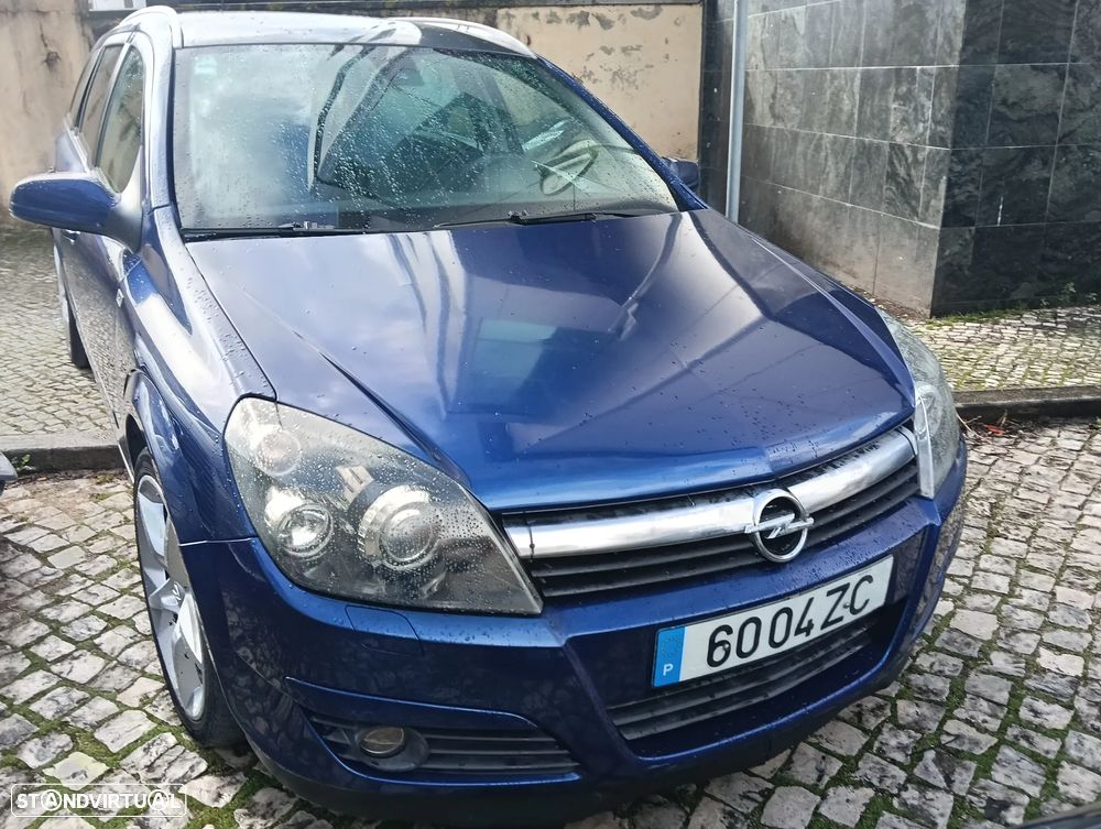 Opel Astra Caravan 1.9 CDTi Cosmo - 13
