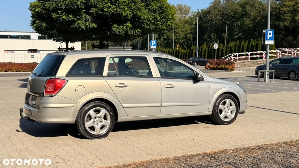 Opel Astra 1.8 Sport - 24