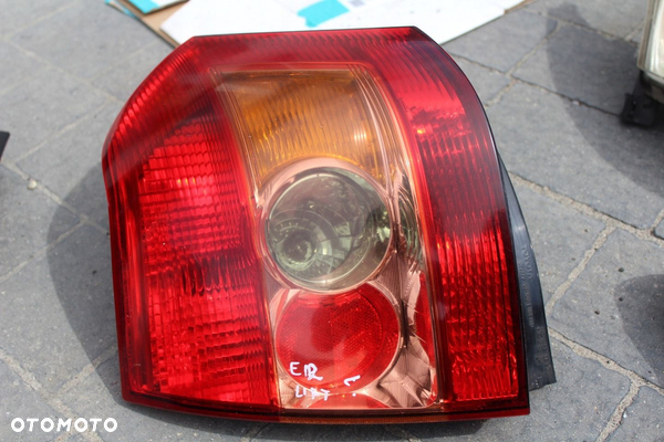 LAMPA LEWA LEWY TYŁ COROLLA E12 HATCHBACK LIFT EUROPA