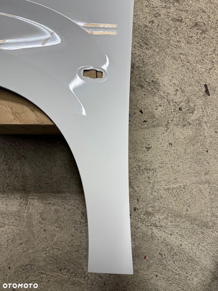 BLOTNIK LEWY PRZÓD BERLINGO PARTNER IV COMBO E ZWYKŁY BIAŁY - 26