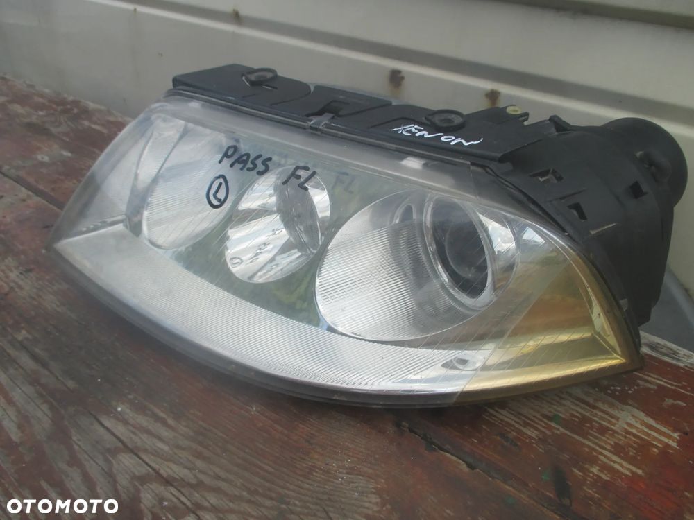 lampa lewa Passat B5 LIFT Xenon Hella Europa - 2