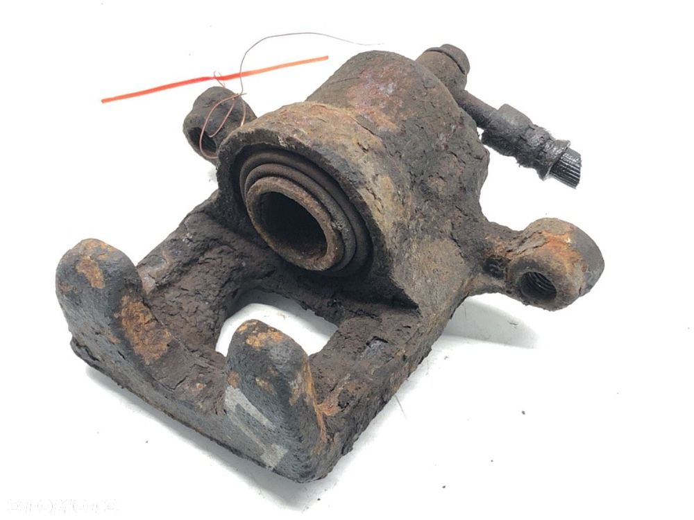 ZACISK LEWY TYŁ  NISSAN QASHQAI / QASHQAI +2 I (J10, NJ10, JJ10E) 2006 - 2014 2.0 104 kW [141 KM] - 3