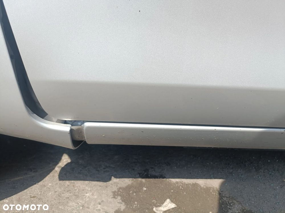 TOYOTA YARIS II 05-11 LIFT 2009 r. 1E7 5D HB drzwi lewy przód LP srebrne * - 4