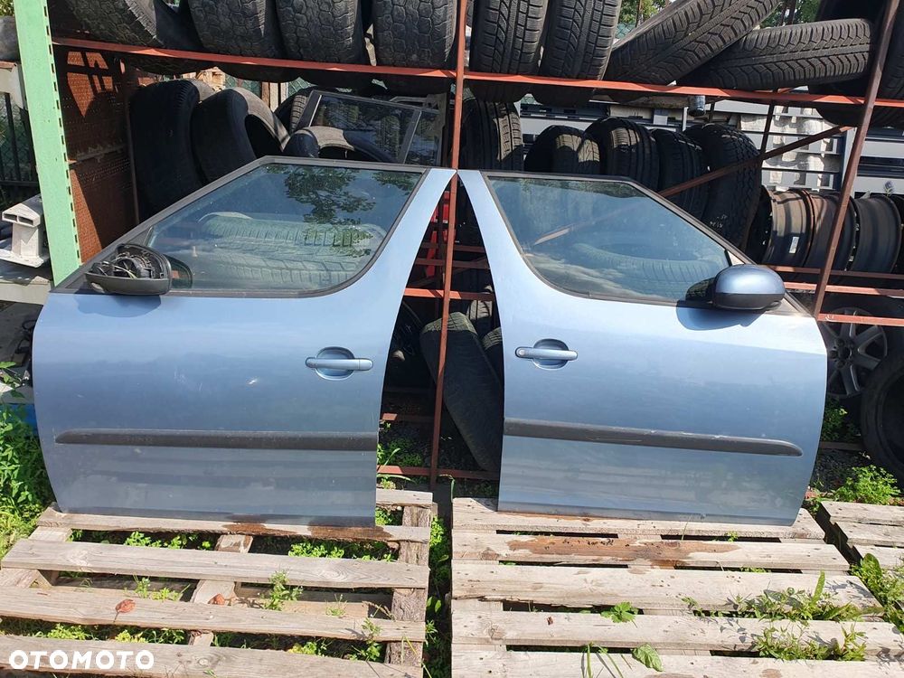 DRZWI L/P PRZÓD SKODA ROOMSTER KOD 9154 - 1