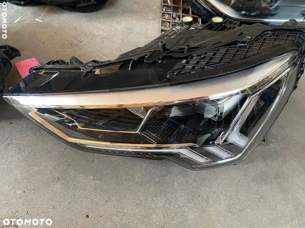 REFLEKTOR AUDI Q3 83A941033 83A941034 - 1