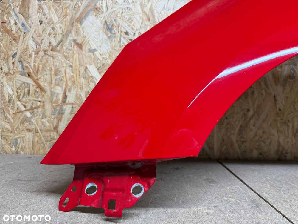 BŁOTNIK LEWY PRZÓD LEWY PRZEDNI OPEL CORSA E CZERWONY 50B - 17