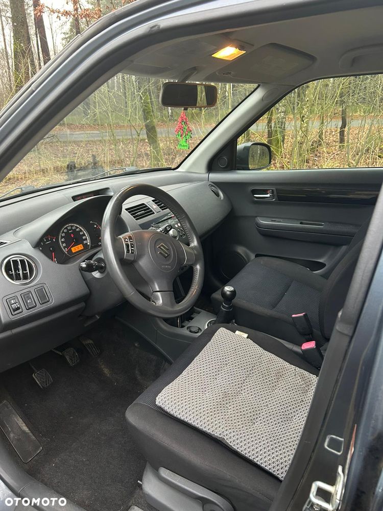 Suzuki Swift 1.3 Club - 7