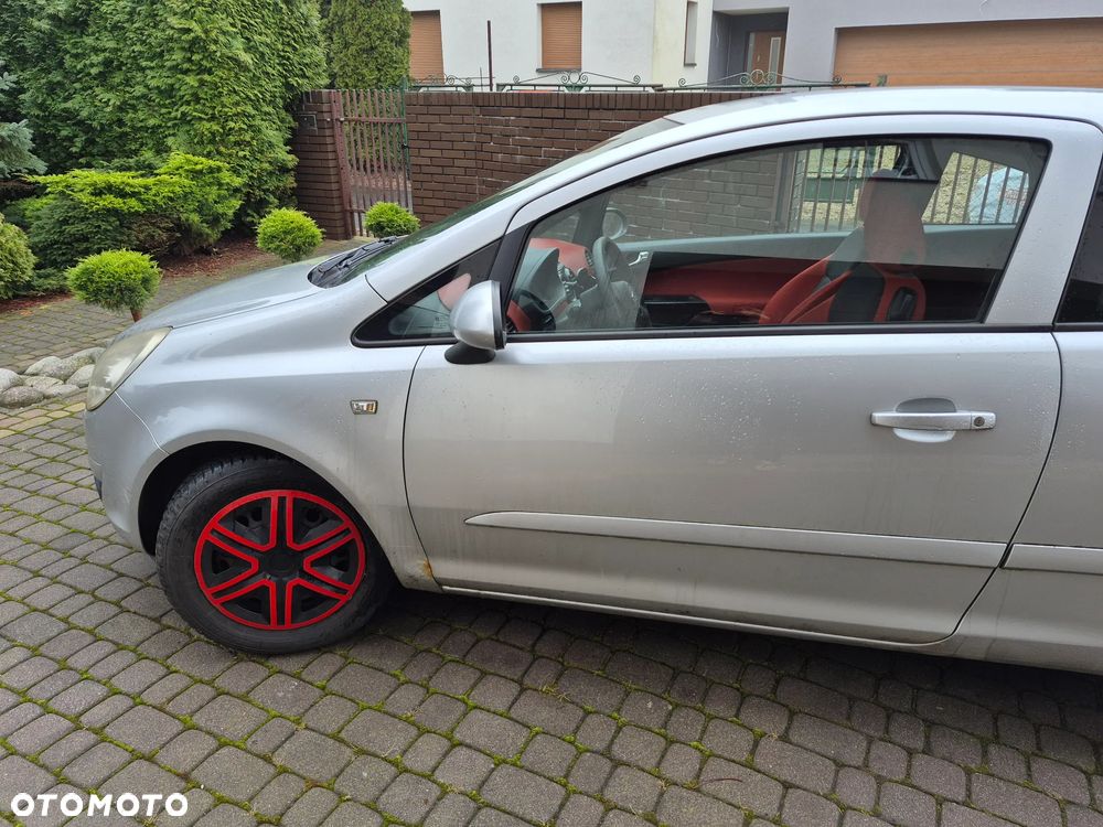 Opel Corsa 1.2 16V Enjoy - 11