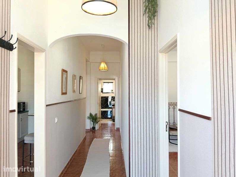 Apartamento renovado com jardim e garagem - Grande imagem: 4/11