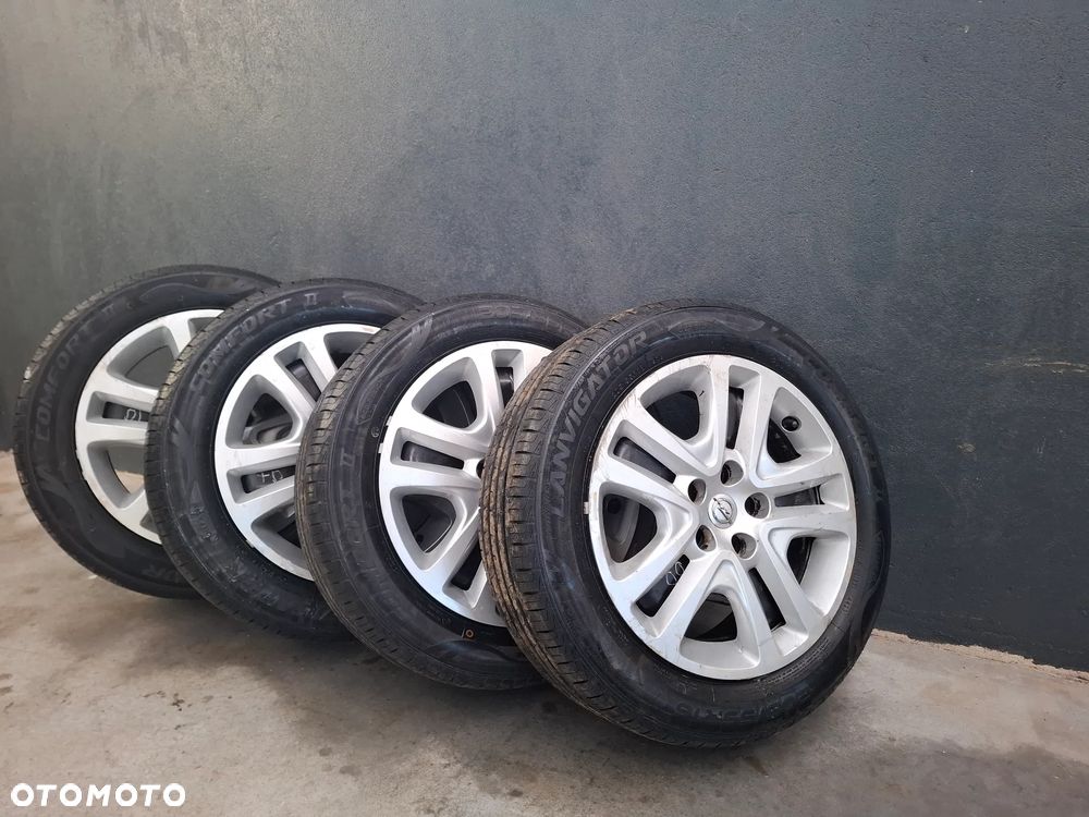 Felgi z kołpakami nowe opony Opel Astra K 5x105 - 1