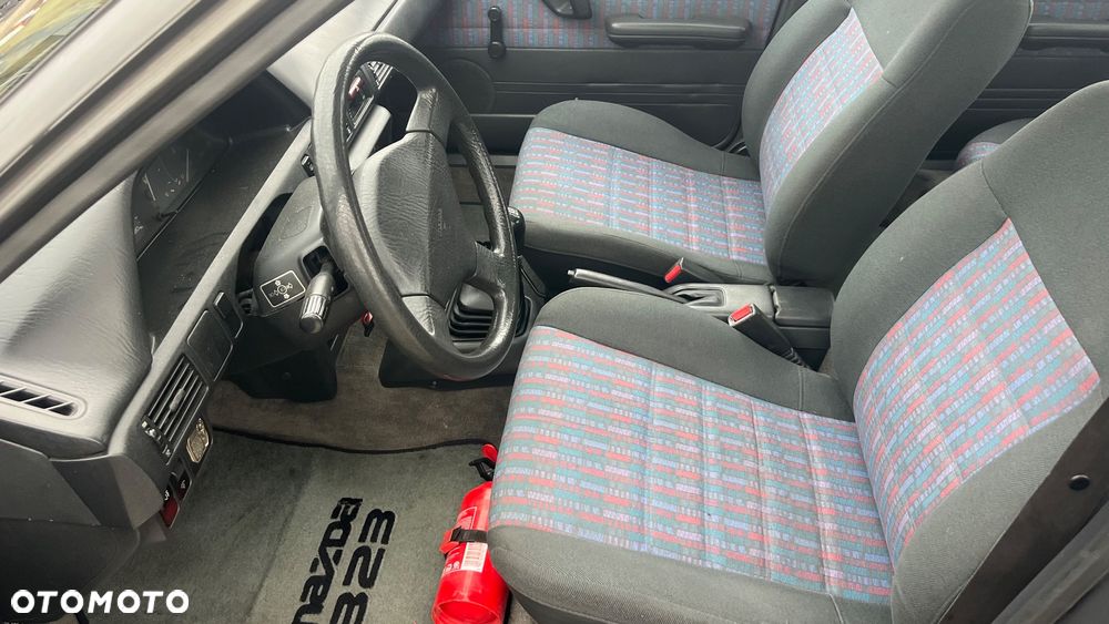 Mazda 323 1.7 D LX - 12