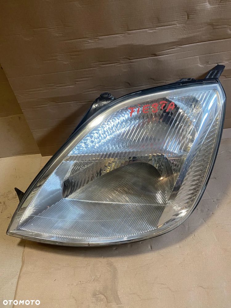Lampa Ford Fiesta MK6 lewa OE