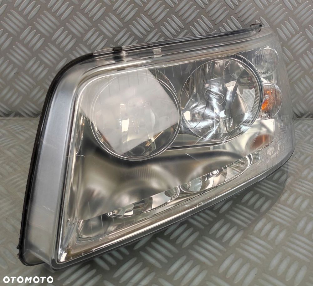 7H1941015T reflektor lampa lewy lewa przód przednia VW TRANSPORTER T5 09- - 2