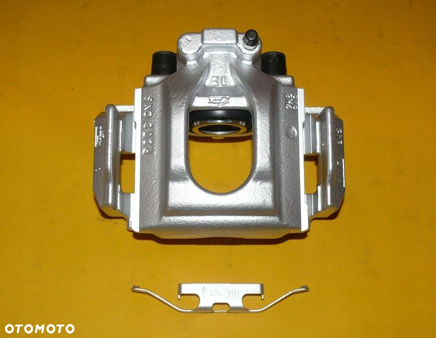 ZACISKI LEWY PRAWY PRZÓD TYŁ VW T5 308/29,5 314/22 - 11