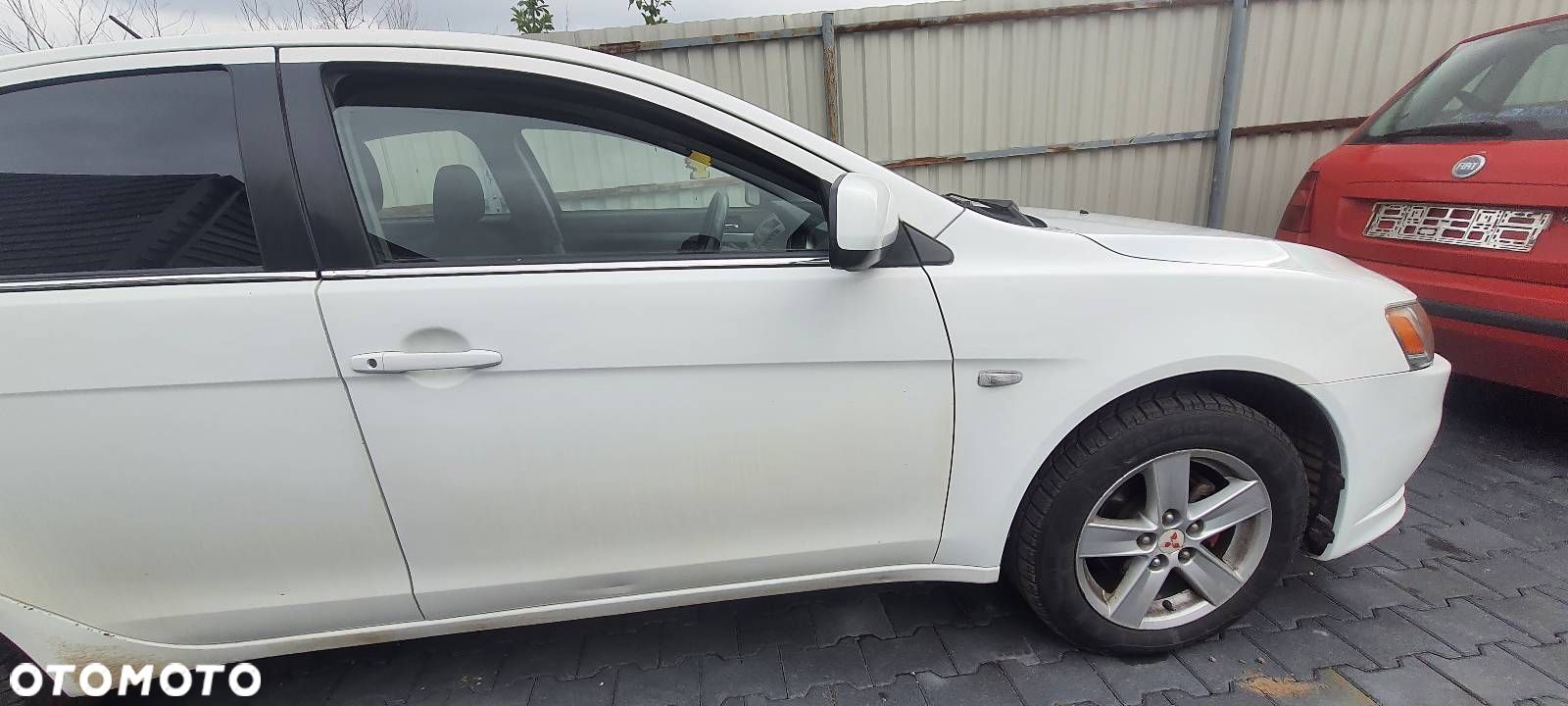 DRZWI PRAWY PRZÓD MITSUBISHI LANCER VIII W37 - 1