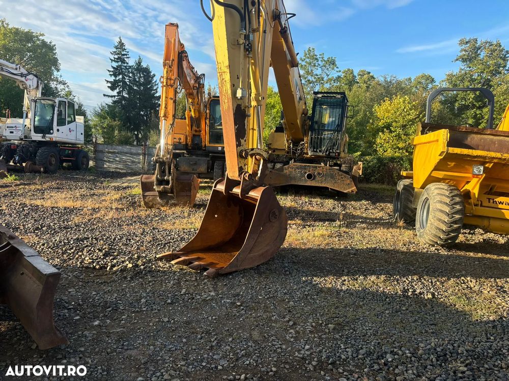 Komatsu PW130-7K - 9