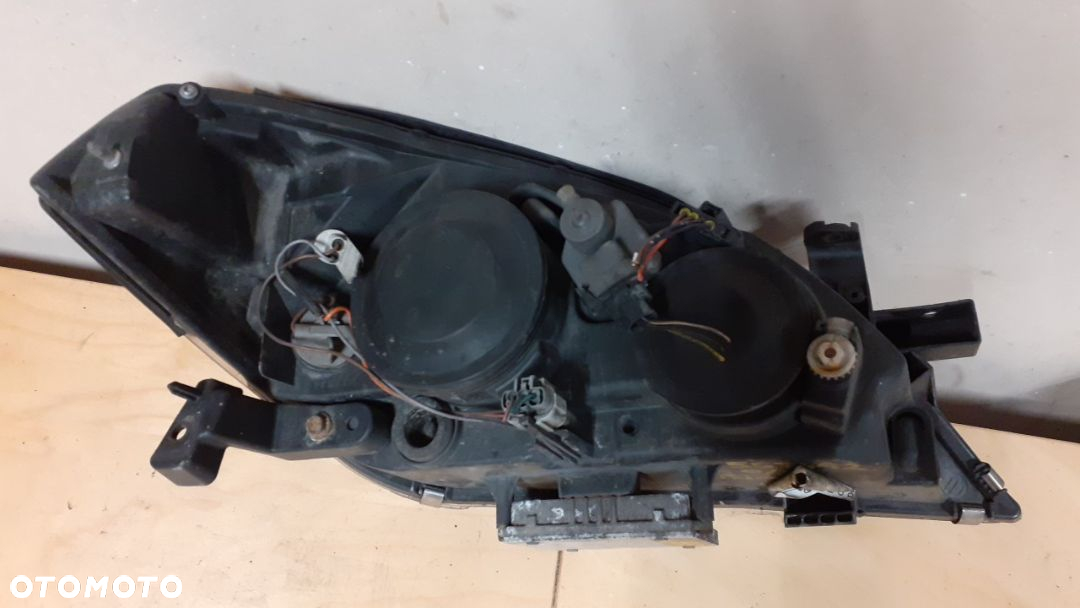 LAMPA PRZOD PRZEDNIA LEWA NISSAN PRIMERA P12 XENON - 2