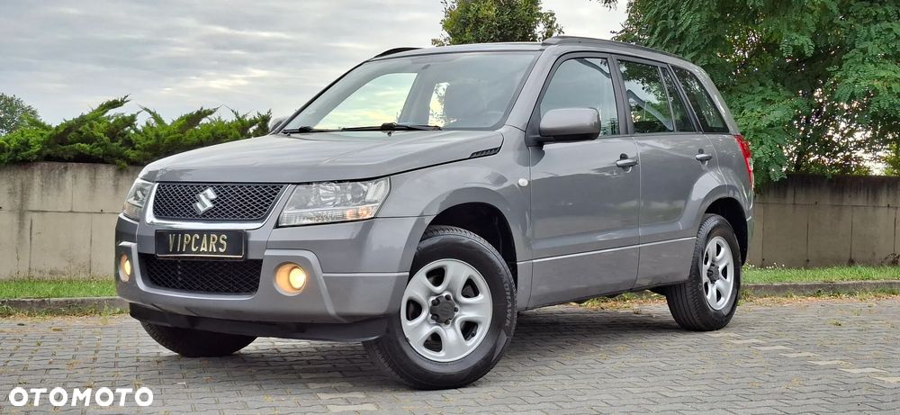 Suzuki Grand Vitara 2.0 Comfort + Family - 1