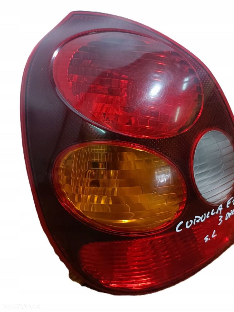 TOYOTA COROLLA E11 99-02 r. 3D LAMPA LEWY TYŁ LEWA TYLNA EU KOITO 12-439+ - 2