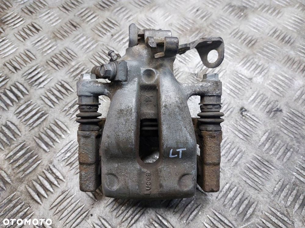 ZACISK HAMULCOWY LEWY TYŁ OPEL ASTRA H ZAFIRA B - 1