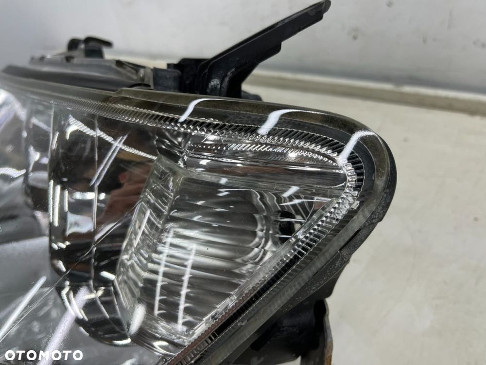 Lampa reflektor Mitsubishi L200 LIFT 10-15r. Pajero Sport II 03-16r. LEWA przednia soczewka EUROPA - 11