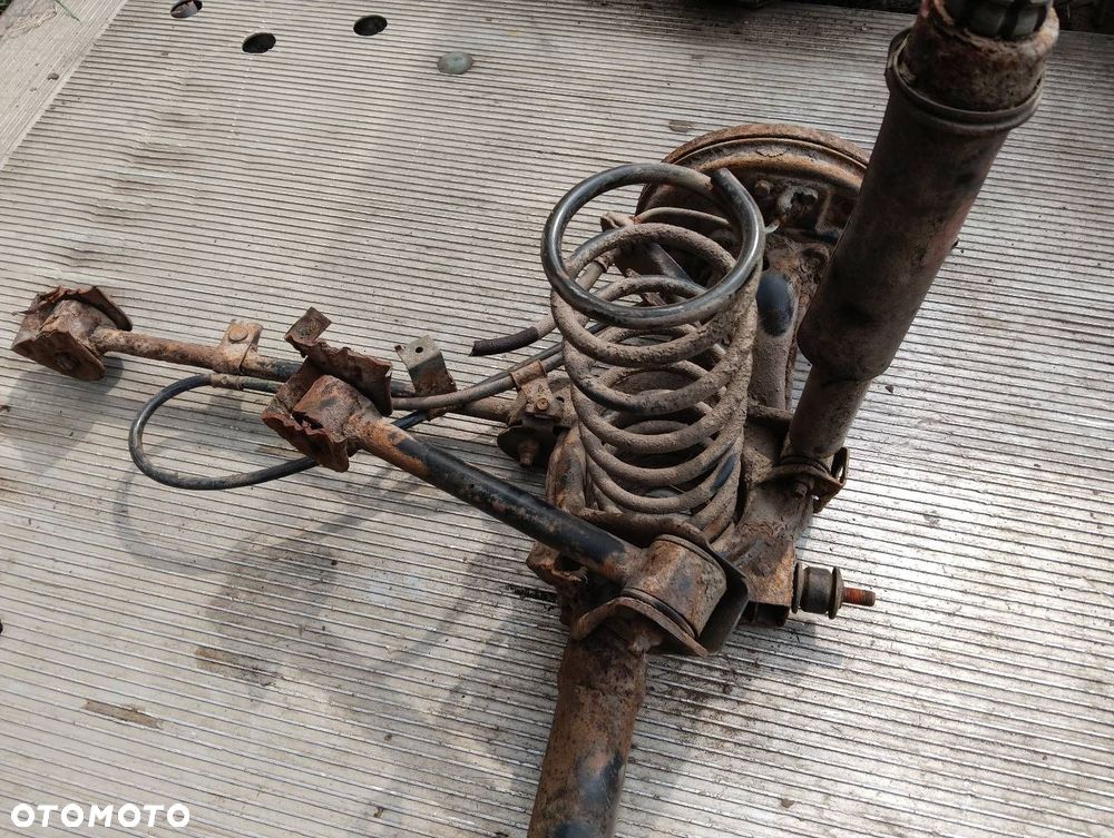 BELKA OŚ ZAWIESZENIA TYŁ BĘBNY BEZ ABS NISSAN MICRA K11 - 2