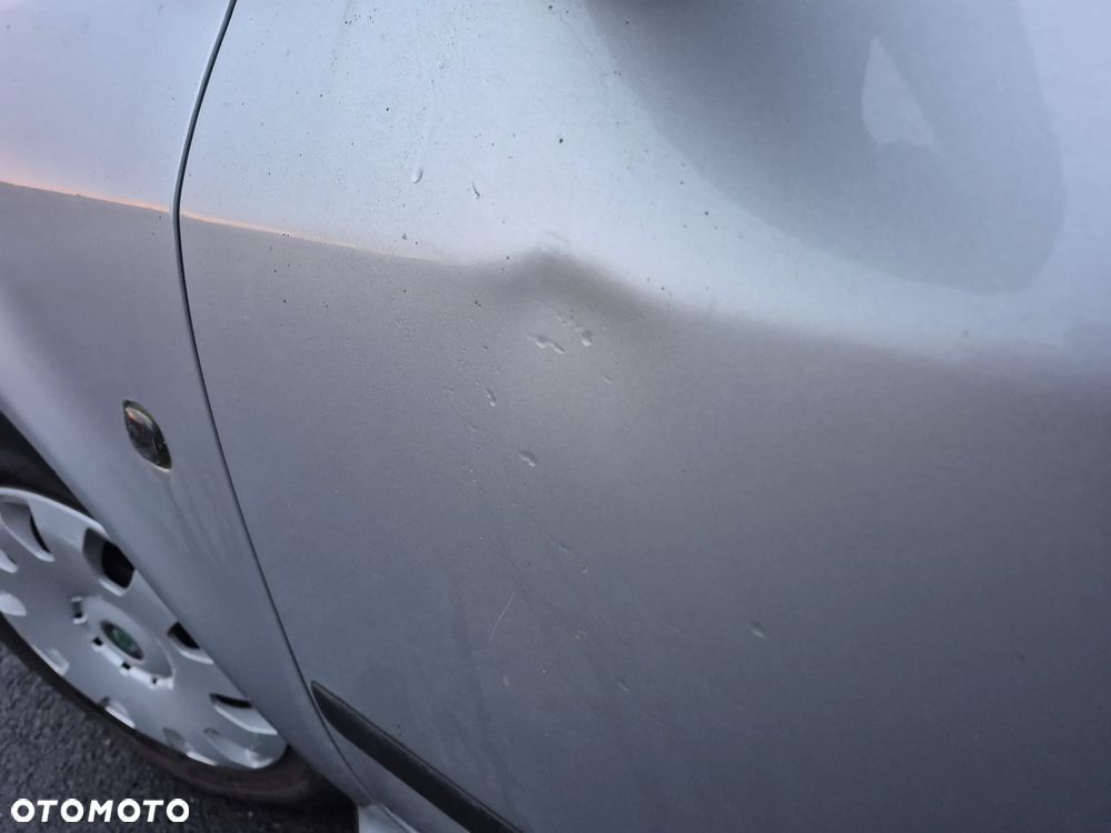 Skoda Octavia 1.6 Tour - 14