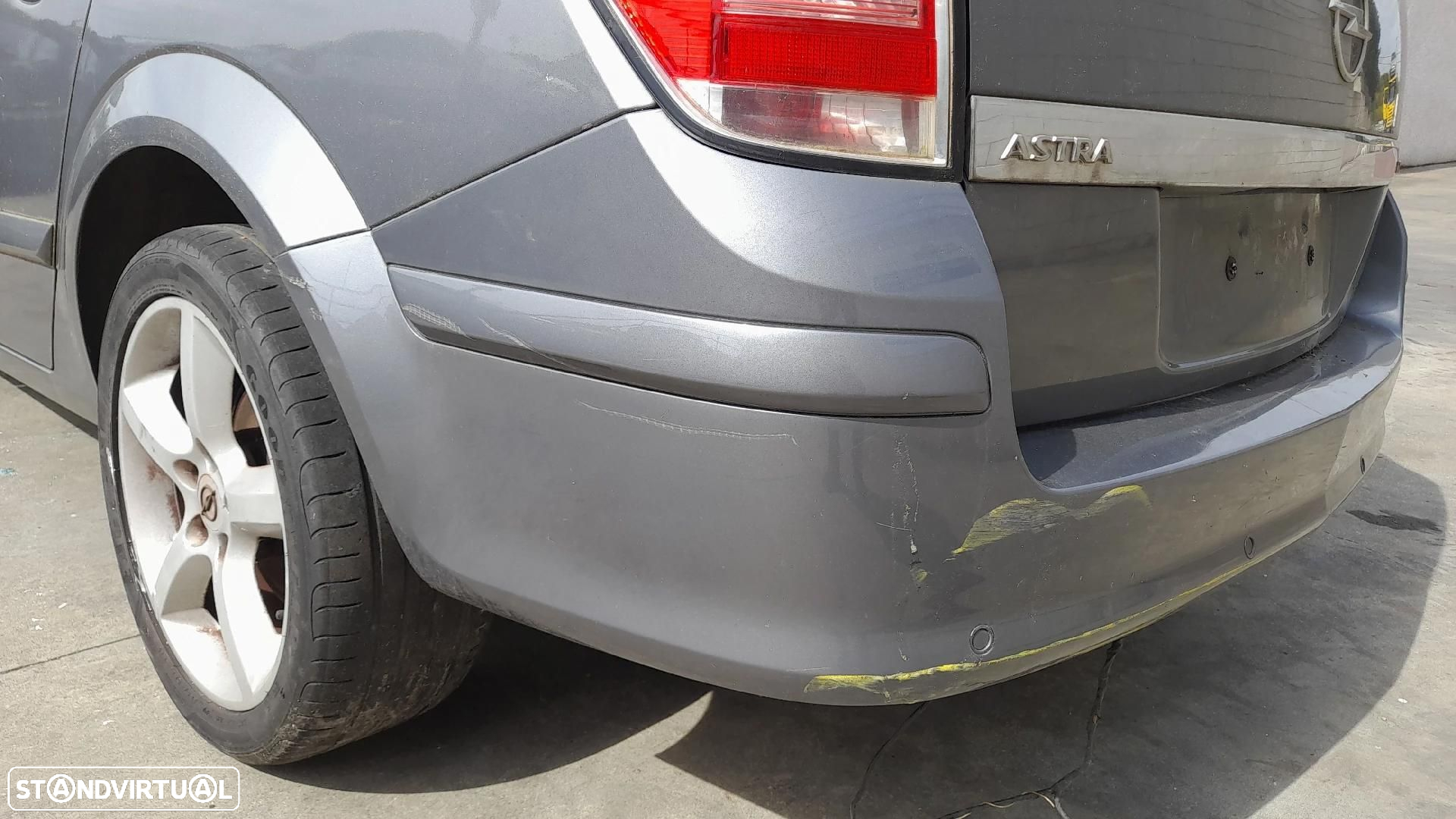 Pára-choques trás OPEL Astra H Caravan (L35) - 2