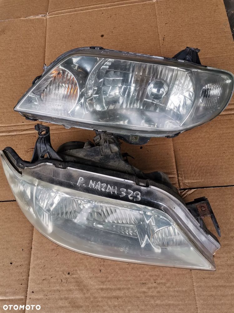 Lampa przod prawy lewy Mazda 323f BJ - 1
