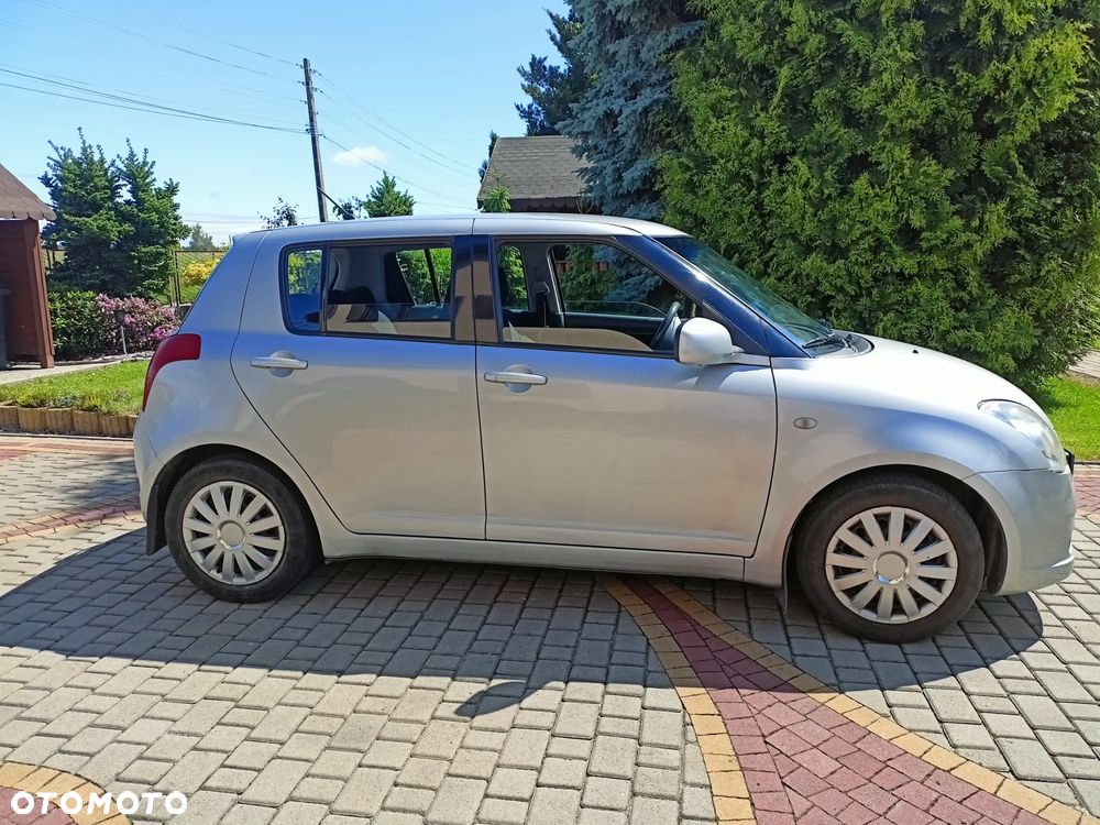 Suzuki Swift 1.3 Club - 9