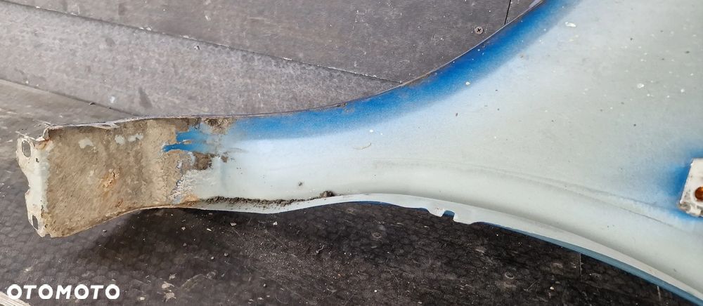 BŁOTNIK PRAWY PRZÓD OPEL CORSA D Z21B - 12