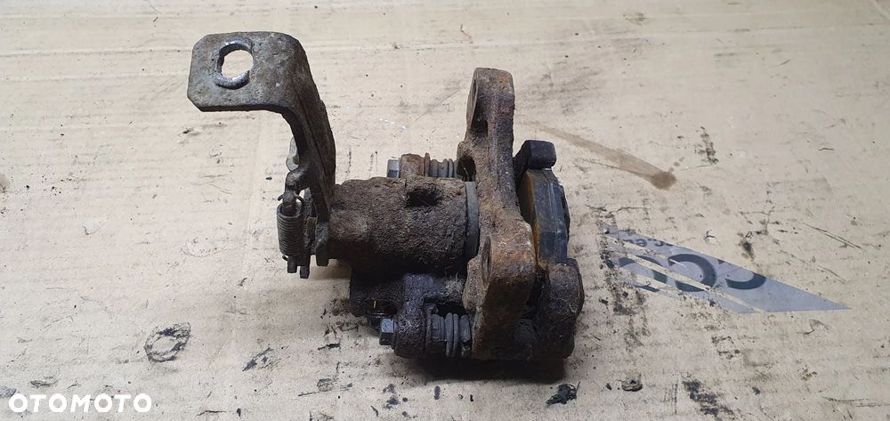 Zacisk hamulcowy lewy tył tylny lewy Nissan Almera Tino - 5