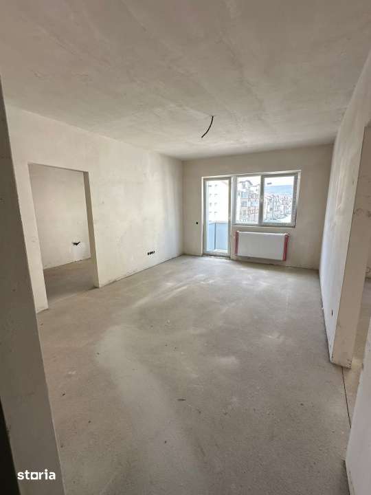 Apartament de 2 camere, SEMIFINISAT, bloc NOU, parcare, Terra — fotografia 1