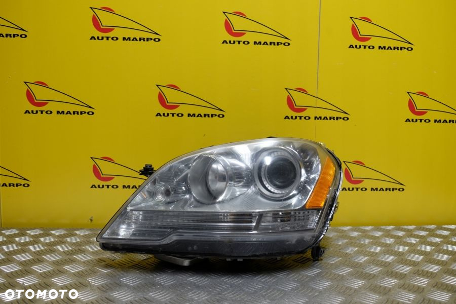 MERCEDES ML II W164 LIFT 2008- REFLEKTOR LAMPA XENON L USA - 2