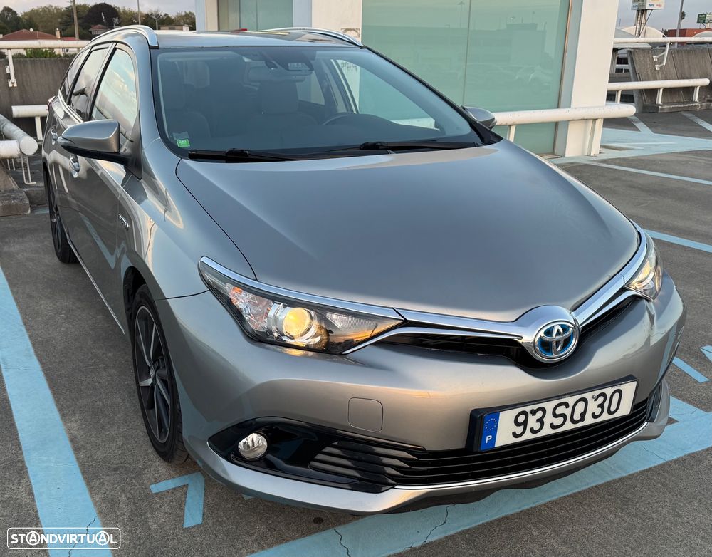 Toyota Auris Touring Sports 1.8 HSD Comfort+P.Sport - 1