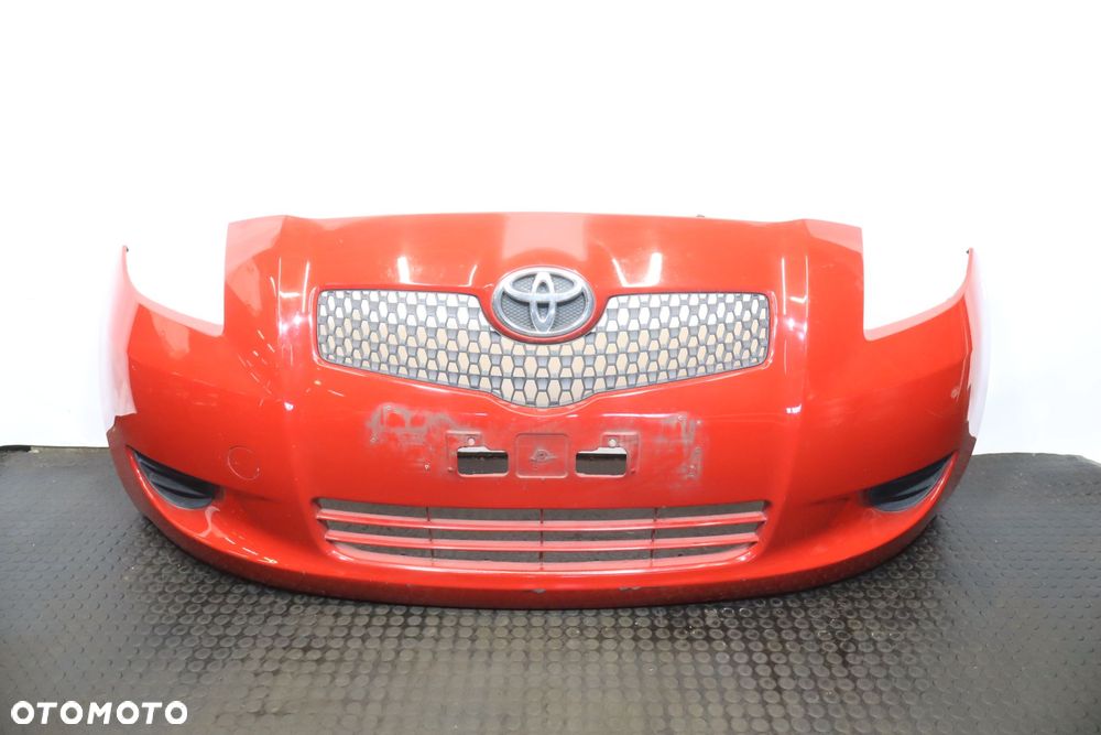 ZDERZAK PRZEDNI  TOYOTA YARIS II 3P0 - 1