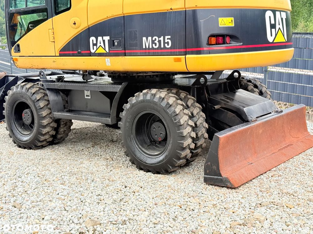 Caterpillar CAT M315C  CATERPILLAR SPROWADZONY  Bardzo Dobry Stan - 10