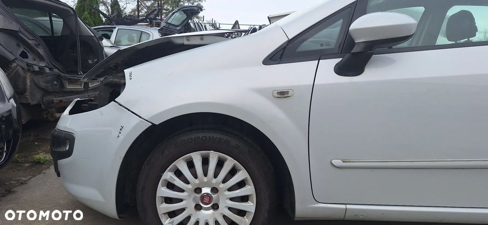 Fiat Grande Punto Evo Błotnik Przód Przedni Lewy Kod Lakieru 760A