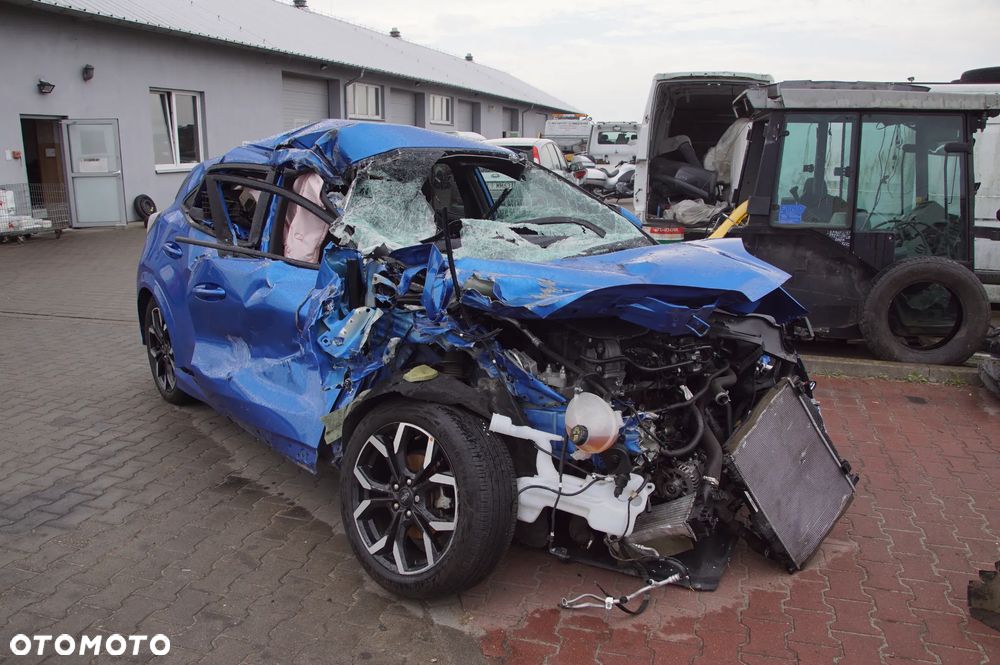 Auto na części - Ford Puma MK2 1.0 EcoBoost 125 KM B7JB N1T1-7000-DA Desert Island Blue 2023R Silnik Skrzynia Drzwi Szyba Zderzak Klapa Lampa Sterownik Moduł Czujnik Fotel Wyświetlacz Deska Kokpit Kierownica - 1
