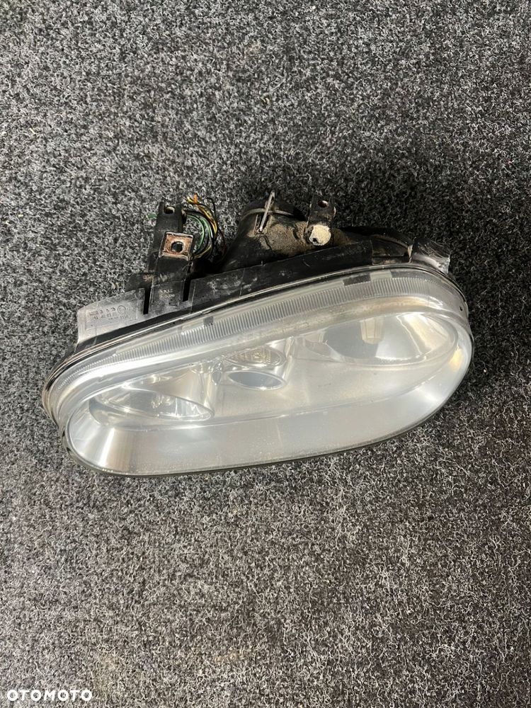 reflektor lewy przód vw golf IV - 4