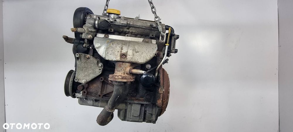 SILNIK SŁUPEK OPEL ASTRA II G - 1